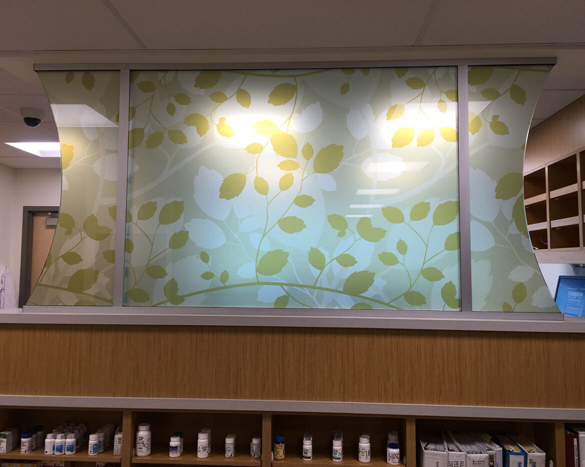 custom printed glass privacy screen for healthcare facility